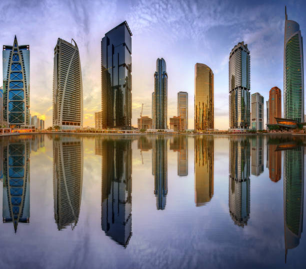 istock Panoramic view of Business bay and Lake Tower, reflection in a river, UAE 655839924
