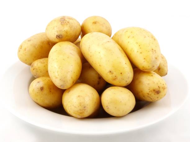 Potatoes on plate stock photo