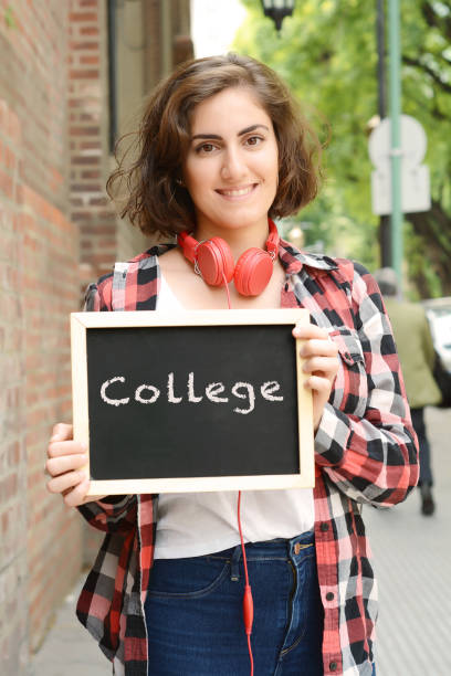 istock Woman holding chalkboard with text 