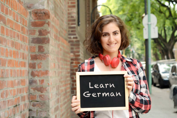 istock Woman holding chalkboard with 