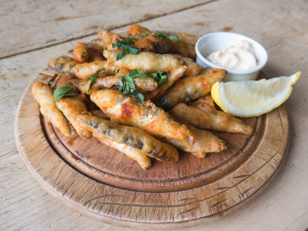 istock Whitebait deep fried on a wooden platter 655864894