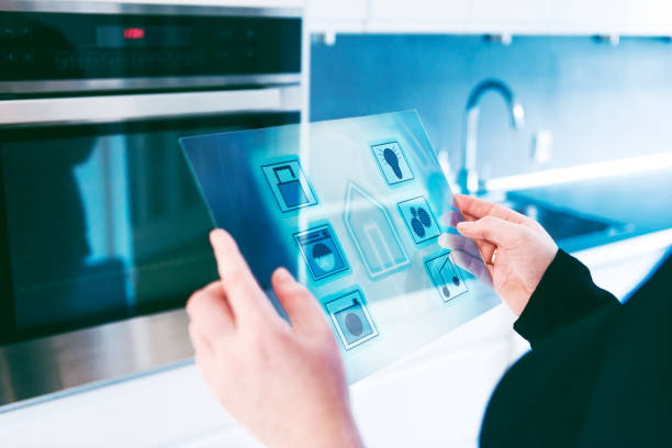 istock Smart home automation in kitchen controlled by futuristic digital tablet 655867512