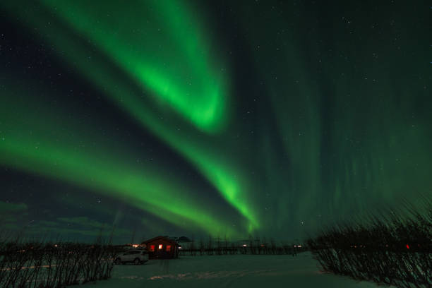 istock Northern lights in a cold night in Iceland, Snow 655868490
