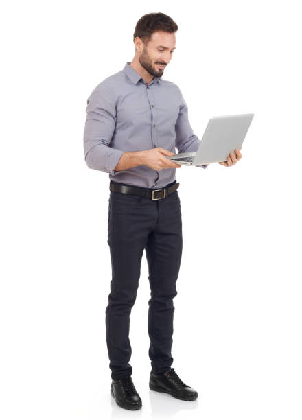 istock Cheerful man with laptop 655868860