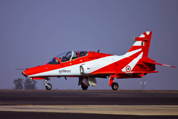 Surya Kiran taxing after landing Bangalore, Karnataka, India - 02/16/2017 :  Taken this picture of Indian Air Force Surya kiran HAWK aircraft taxing after landing. Taken this picture after the trainer warplane from side when it was crossing the spectators. These airplanes are performing in front of thousands of spectators at Aero India. british aerospace stock pictures, royalty-free photos & images