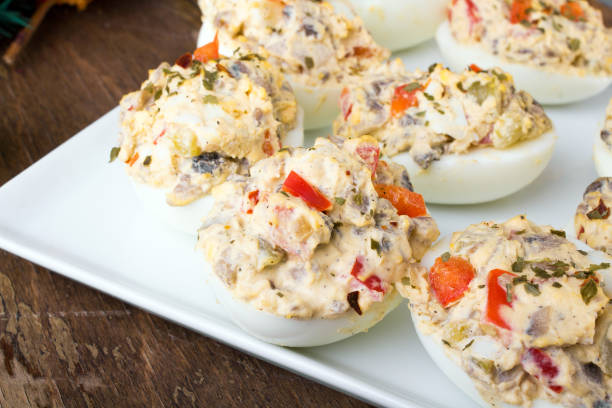 istock stuffed eggs with peppers, mushrooms and herbs - selective focus 655887324