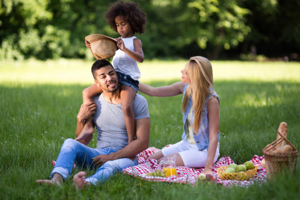istock Family having fun and picnic in nature 655897570