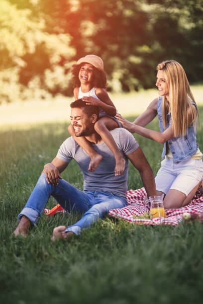 istock Family having fun and picnic in nature 655897662