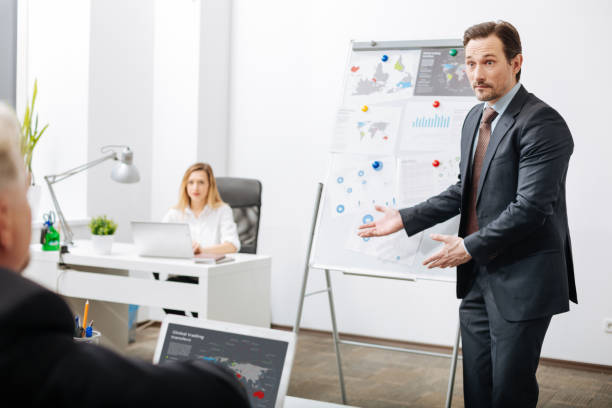istock Surprised employee discussing the project in the office 655903228
