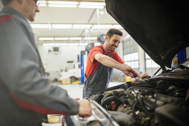 istock Car mechanics working on car maintenance 655909554