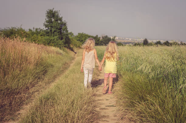istock friend walking in the countryside 655912812
