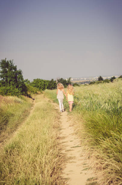 istock friend walking in the countryside 655912894