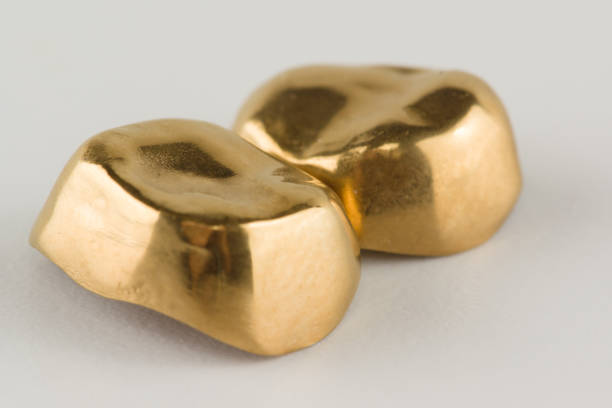 istock steel crowns with yellow coated 655915460