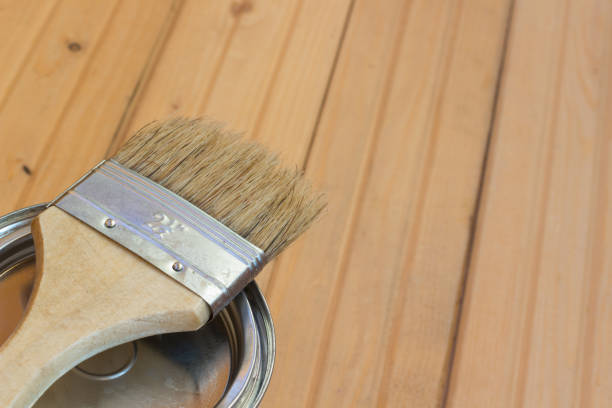 istock Paintbrush and paint pot on the floor 655919894