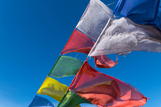 istock Buddhist Prayer Flags with blue sky on background in India 655920312