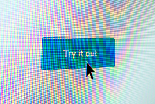 Closeup of an Try It Out button with a mouse arrow on a computer screen
