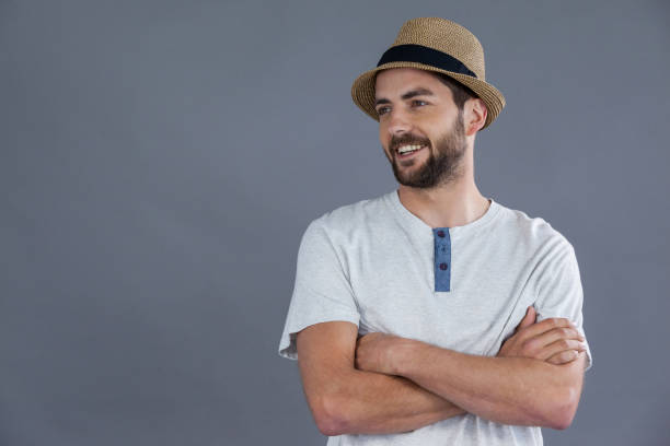 istock Happy man in white t-shirt and fedora hat 655934766