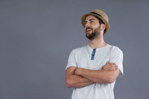 istock Happy man in white t-shirt and fedora hat 655934852