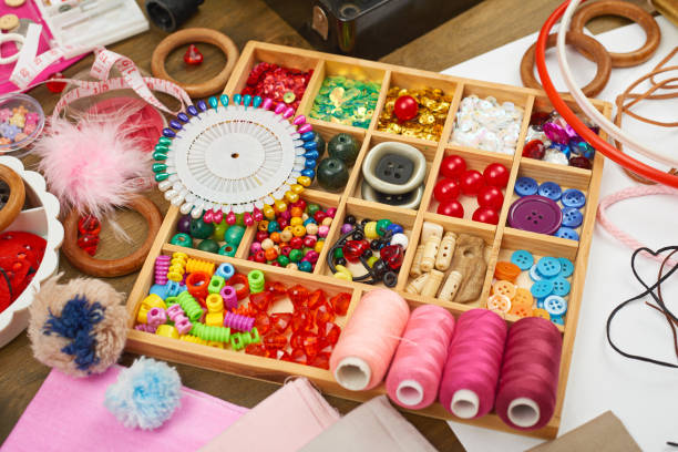 istock thread and sewing accessories top view, seamstress workplace, many object for needlework, embroidery, handmade and handicraft 655944558