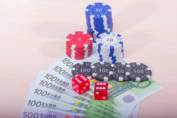 istock Casino chips and money 655947856
