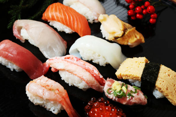 istock Closeup of mixed sushi rolls on a plate 655951294