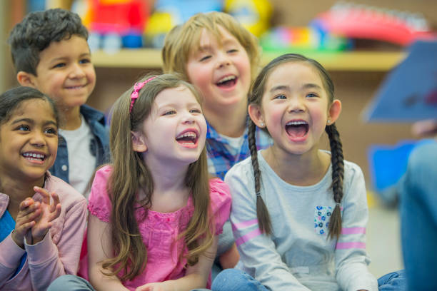 istock Listening to Their Teacher Read a Story 655969516