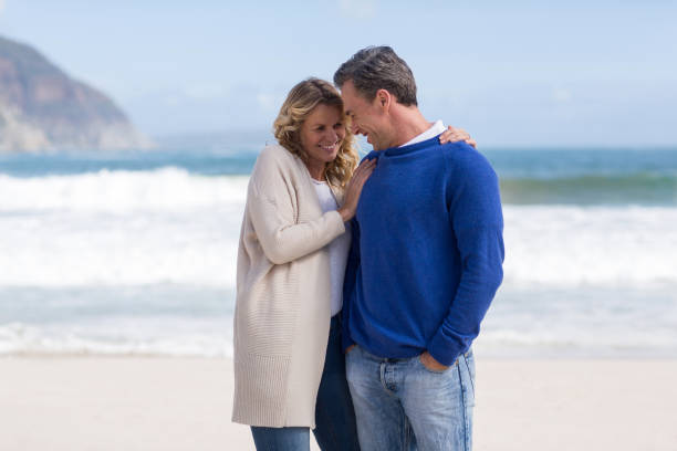 istock Mature couple enjoying on the beach 655973568