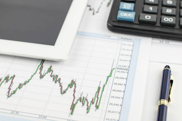 istock Tablet PC, calculator, pen and financial graph on white background. 655978858
