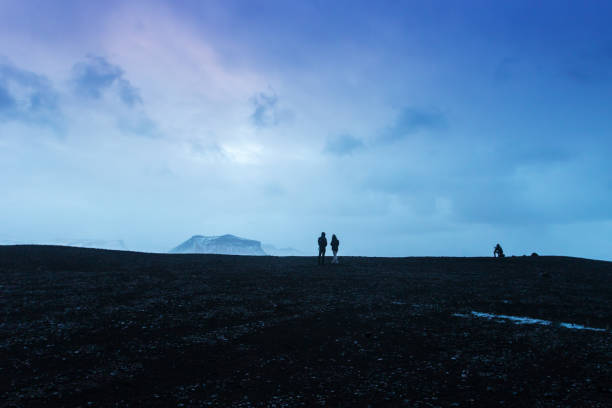The black sand beach of Reynisfjara and the mount Reynisfjall from the Dyrholaey promontory in the southern coast of Iceland.