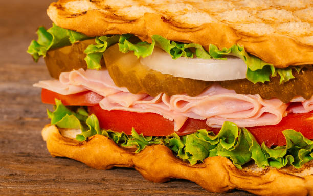 istock Closeup sandwich with ham,cheese and fresh vegetables 655985110