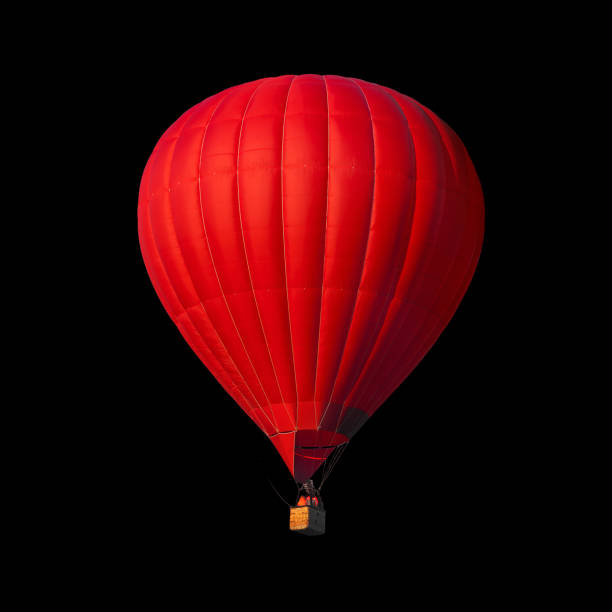 Red air balloon isolated on black stock photo