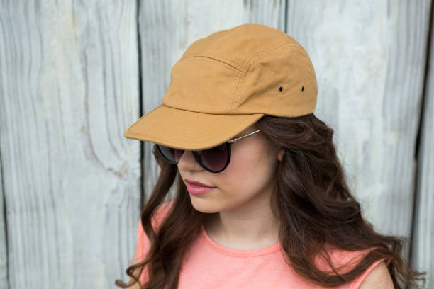 istock Woman in brown cap and sunglasses 655994228