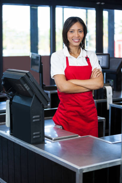 istock Female staff standing at cash counter 656005776