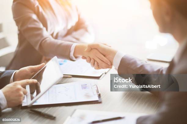 Business People Shaking Hands Finishing Up Meeting Stock Photo - Download Image Now