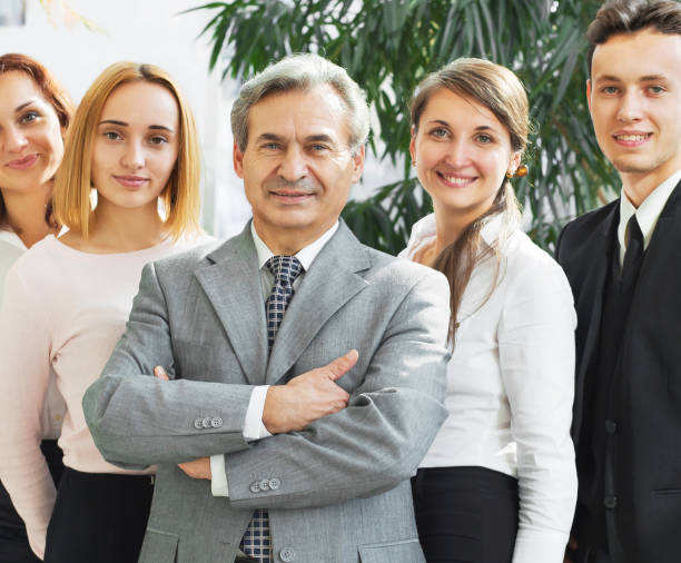 istock successful business team on background of bright, modern office 656005836