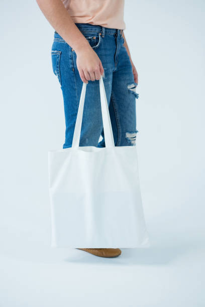 istock Woman carrying shopping bag 656011734