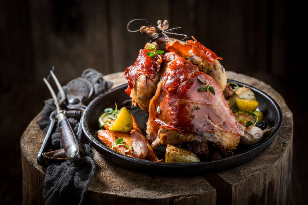 istock Grilled pheasant with bacon and vegetables and spices 656017024