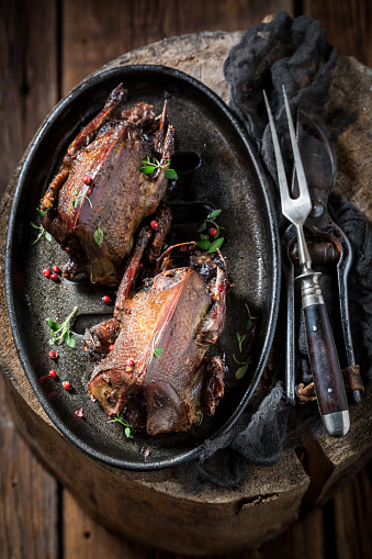 Two roasted doves with pepper and spices