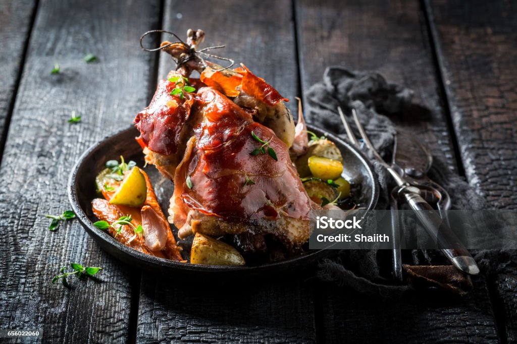 Grilled pheasant with bacon and spices and vegetables Pheasant Meat Stock Photo