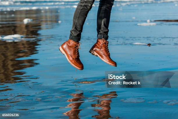 Jumping In Boots Stock Photo - Download Image Now - Jumping, Human Foot, Leather