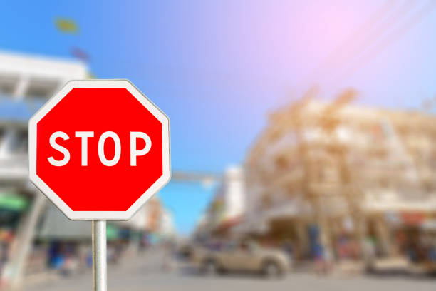 istock Stop sign by the City road 656028982