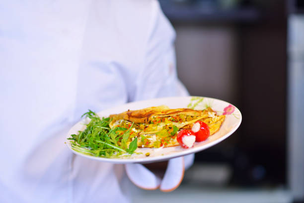 istock Chef starts preparing omelet. Only clean products. 656029118