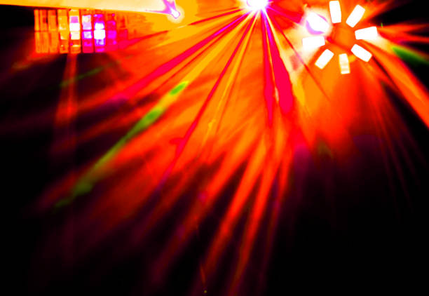 istock Lighting disco with bright beams of searchlight and laser show 656031784