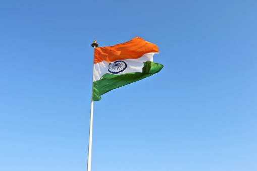 Tiranga (Tri coloured) the national flag of India hoisted in central park, Rajiv Chowk, New Delhi, India.