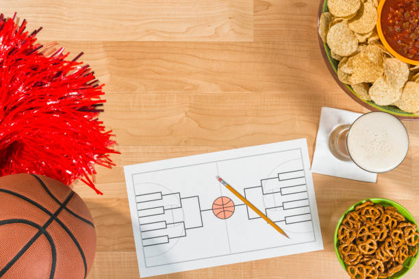 istock College basketball tournament party with empty 16 team bracket 656032092
