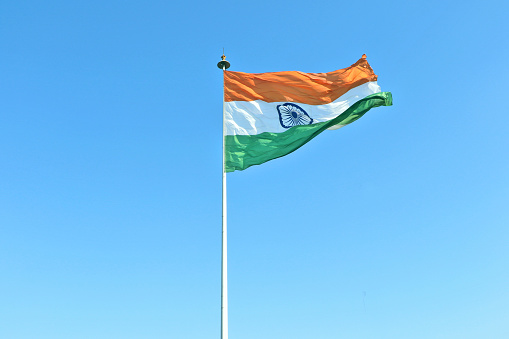 Tiranga (Tri coloured) the national flag of India hoisted in central park, Rajiv Chowk, New Delhi, India.
