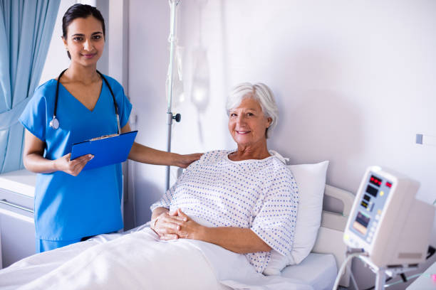 istock Female doctor and senior patient smiling 656036552