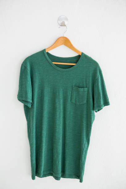 istock Green t-shirt with pocket on hanger 656039914