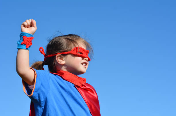 istock Superhero child - girl power 656040710