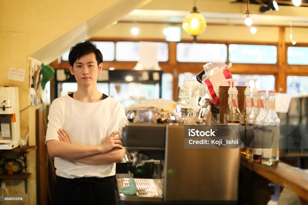 Cafe du gestionnaire masculin japonais - Photo de Petite entreprise libre de droits